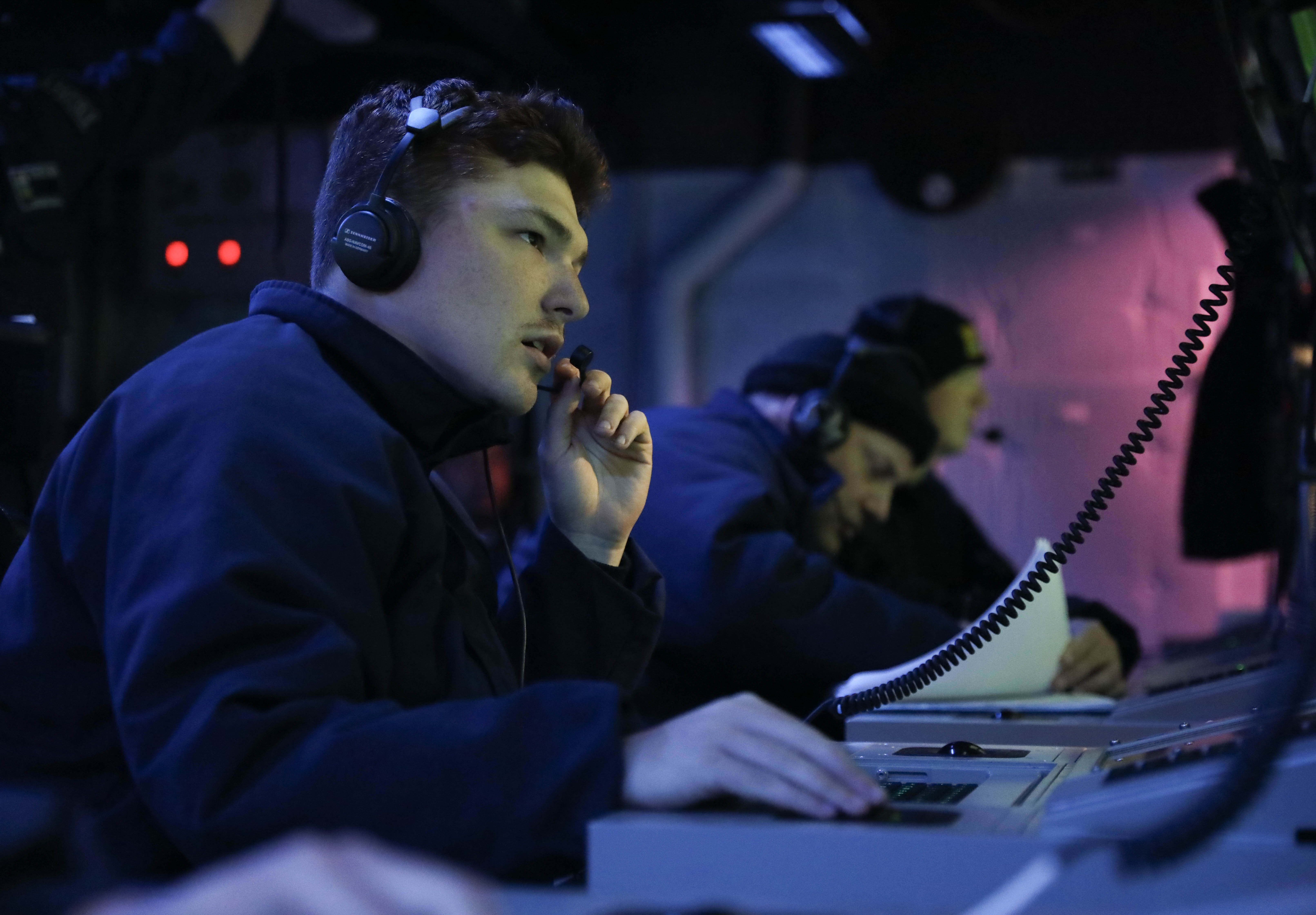 This is an image of a U.S. Navy sonar technician.